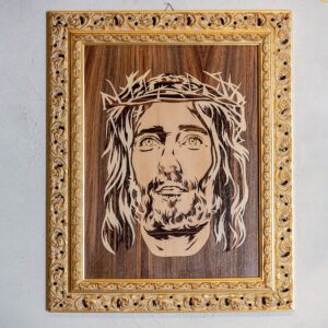 Handmade marquetry portrait of Jesus Christ, crafted in Italy from 255 precision-cut wood veneers using walnut, oak, and maple, symbolizing faith and fine craftsmanship.