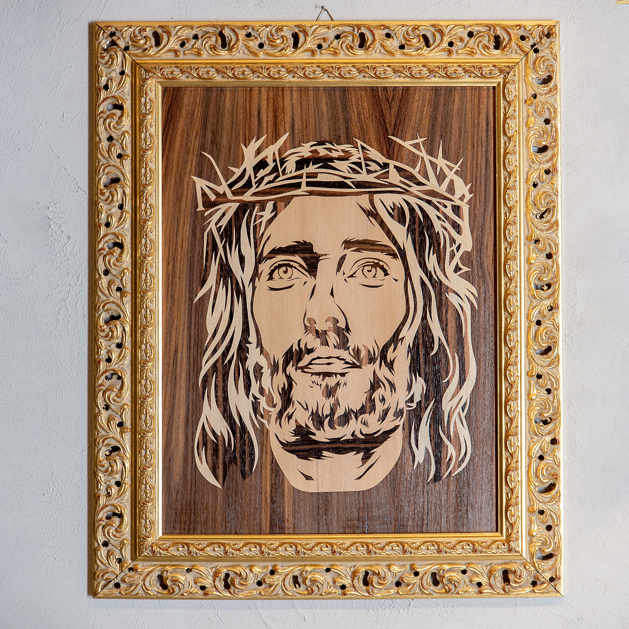 Handmade marquetry portrait of Jesus Christ, crafted in Italy from 255 precision-cut wood veneers using walnut, oak, and maple, symbolizing faith and fine craftsmanship.